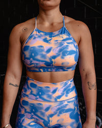 Woman wearing Lift High Neck Sports Bra - Apricot Mist | Model:Tiare | Size:M