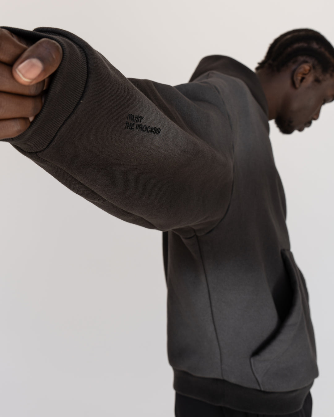 Man wearing Memory In Motion 500gsm Ultra Heavyweight Washed Hoodie - Charcoal Washed | Model:Okello | Size:M