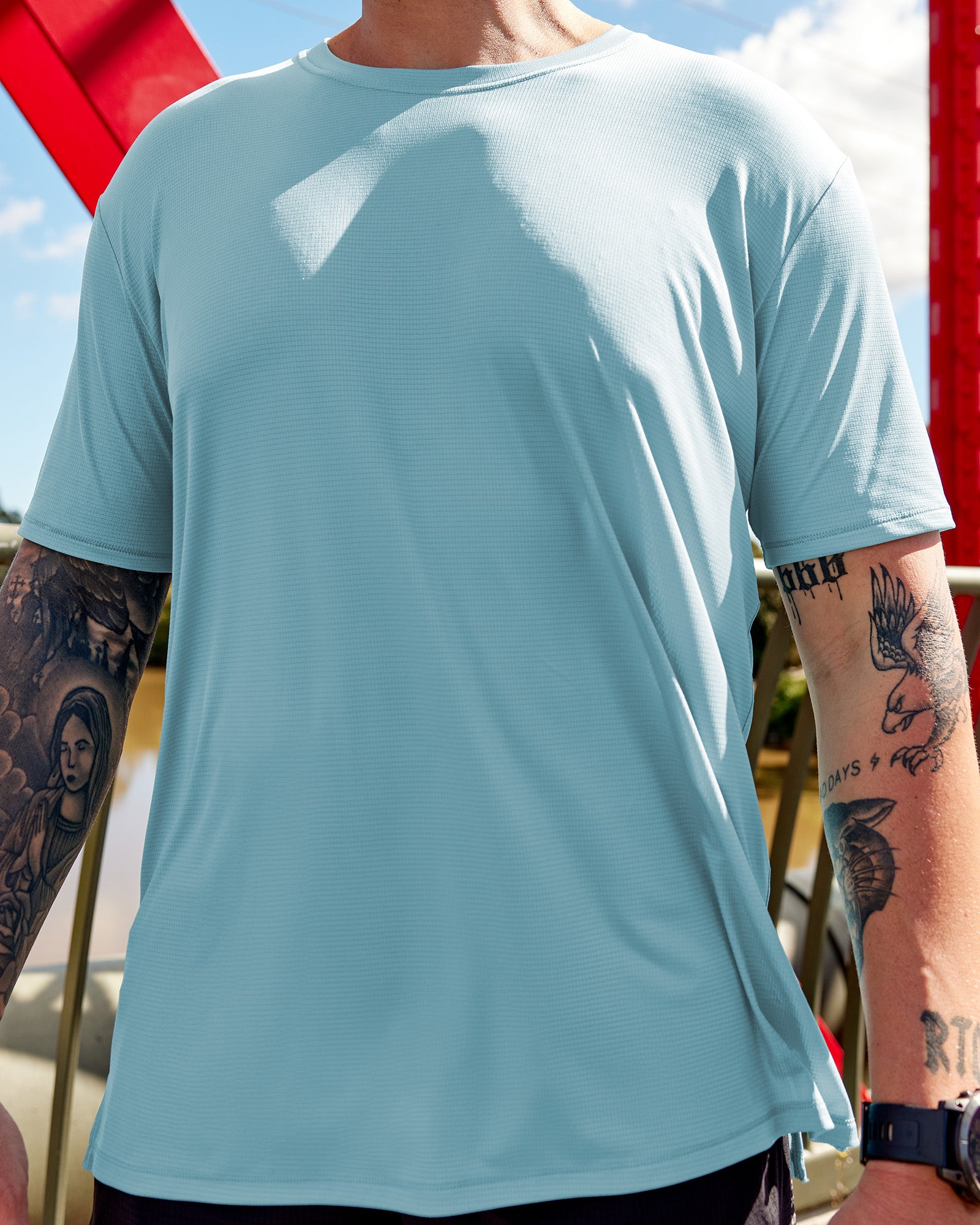 Man wearing Pace Running Tee - Retro Blue | Model:Macca | Size:M