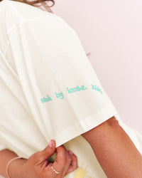 Woman wearing Mother's Day FLXCotton Oversize Tee - Off White | Model:Emma | Size:M