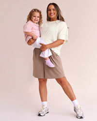Woman wearing Mother's Day FLXCotton Oversize Tee - Off White | Model:Emma | Size:M