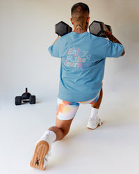 Man wearing Our Journey Heavyweight Oversized Tee - Azure Blue-Rainbow | Model:Justin | Size:M