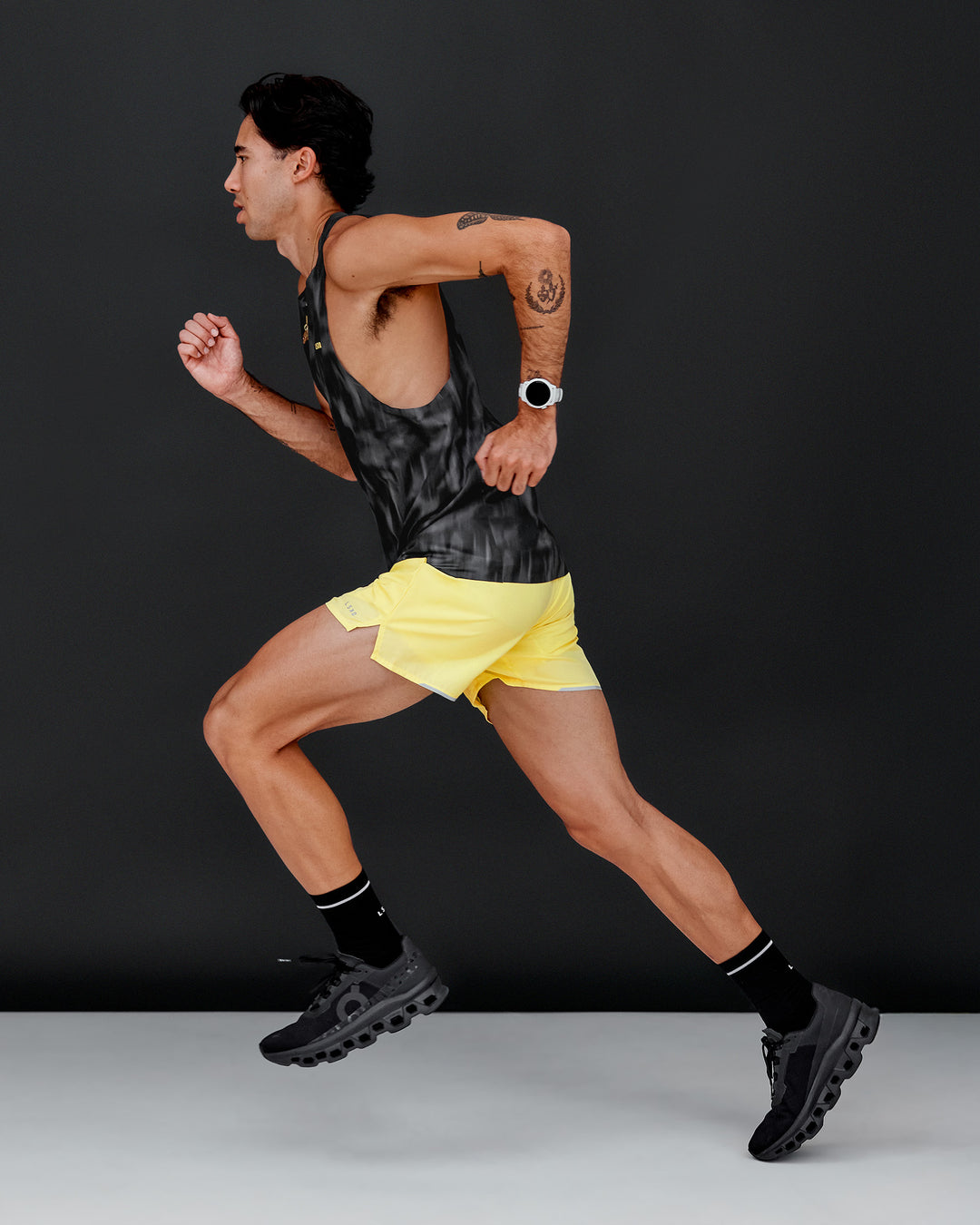 Man wearing Pace 5" Lined Running Short - Yellow Fizz | Model:Jared | Size:M