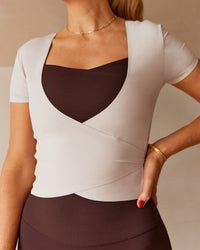 Woman wearing Peaches Wrap Cinch Top - Shale Beige | Model:Tori | Size:M