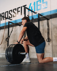 Man wearing Rep 5'' Performance Short - Night Sea | Model: | Size:M
