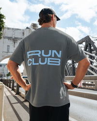 Man wearing Runner's FLXCotton Oversized Tee - Dark Storm Washed-Open Air | Model:Julz | Size:M