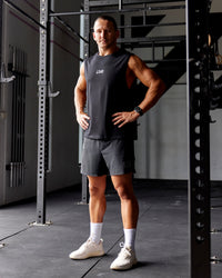 Man wearing Static Grit FLXCotton Tank - Black | Model:Jaiden | Size:M