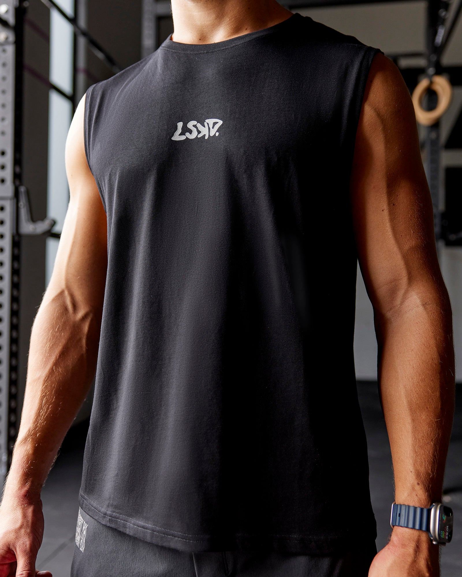 Man wearing Static Grit FLXCotton Tank - Black | Model:Jaiden | Size:M