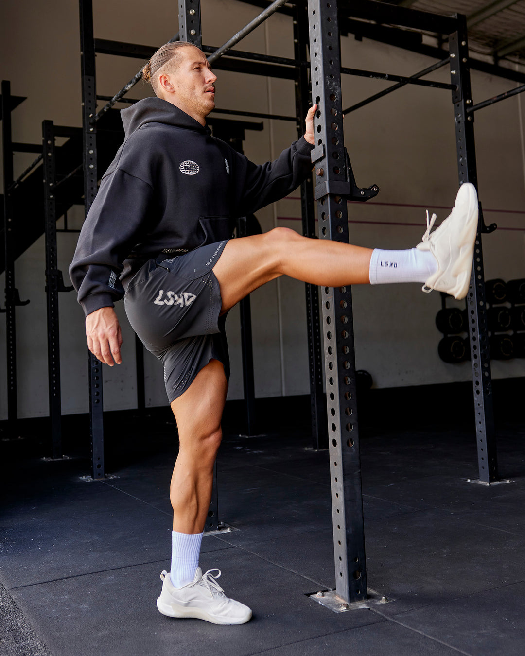 Man wearing Static Grit Lift 6" Short - Black-Alloy | Model:Jaiden | Size:M - view 2