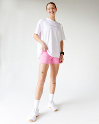 Woman wearing Unity Go-To FLX Cotton Tee - White-Rainbow | Model:Adi | Size:M