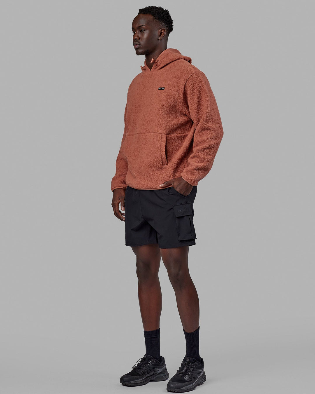 Man wearing Unisex Alpine Hoodie - Cedar Wood