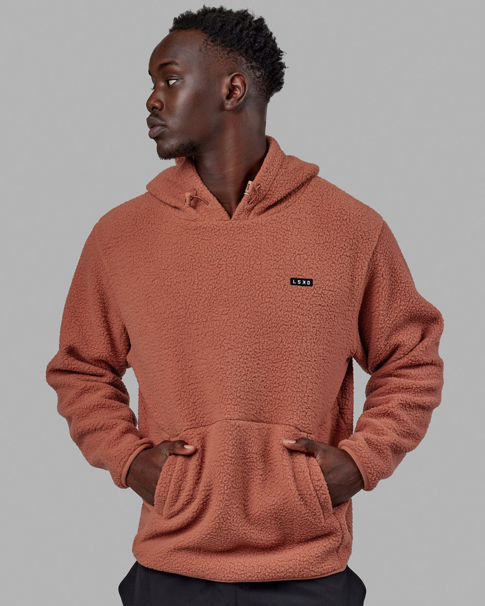 Man wearing Unisex Alpine Hoodie - Cedar Wood