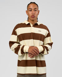 Man wearing Clubhouse Unisex Polo - Off White-Brown | Model:Malebo | Size:M