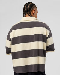 Man wearing Oversized Rugby Polo - Off White-Grey | Model:Malebo| Size:M