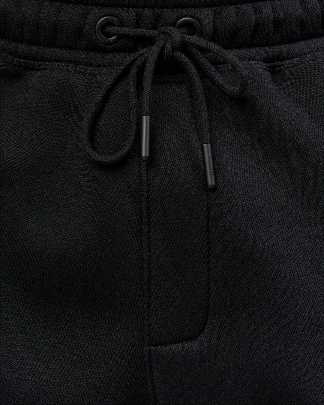 Man wearing Static Grit Baggy Track Pant - Black-Alloy | Model:Jaiden | Size:M