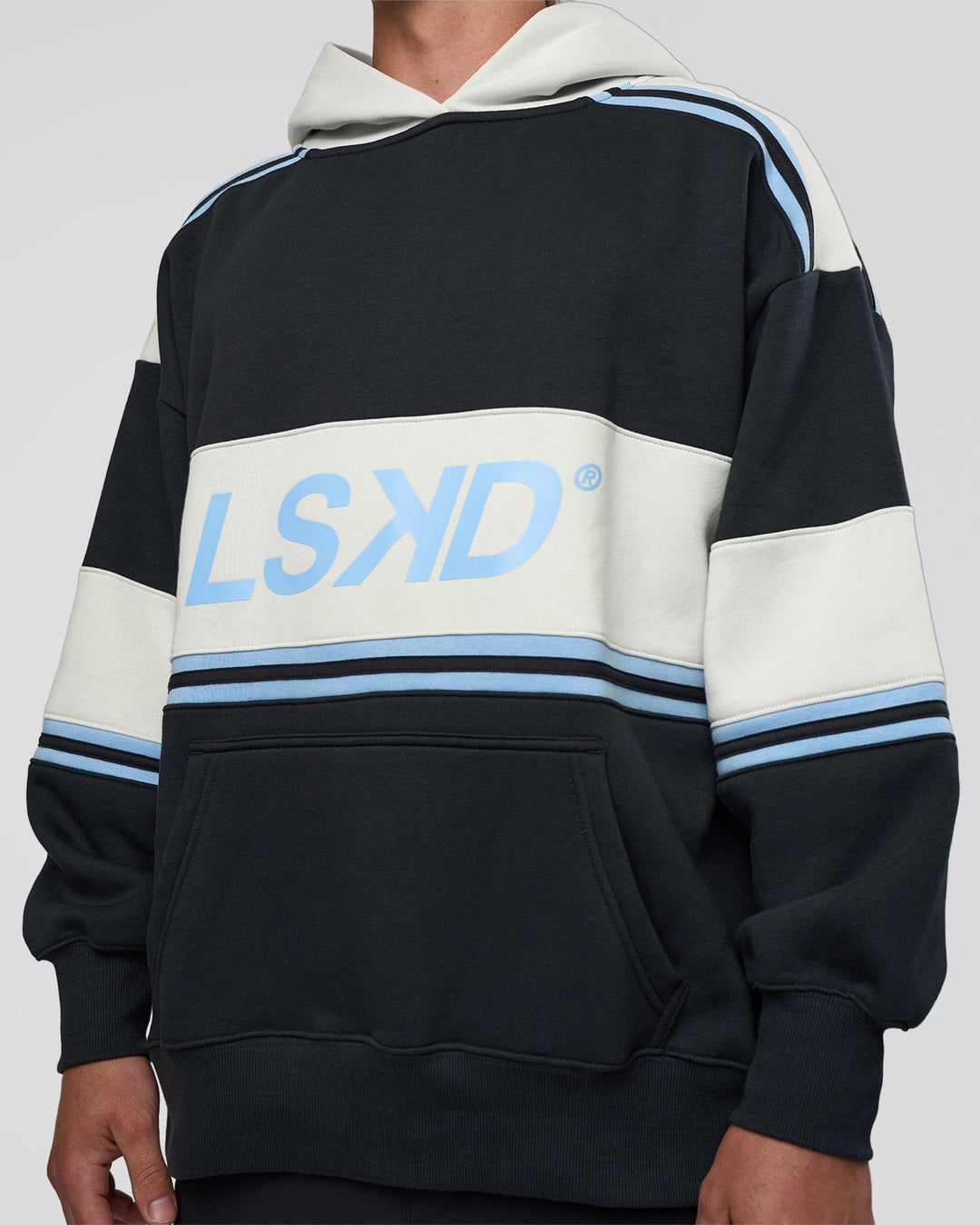 Man wearing A-Team Oversized Hoodie - Caviar-Open Air | Model:Konnor | Size:M