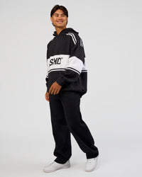 Man wearing A-Team Oversized Hoodie - Caviar-White | Model:George | Size:M