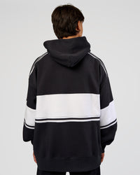 Man wearing A-Team Oversized Hoodie - Caviar-White | Model:George | Size:M