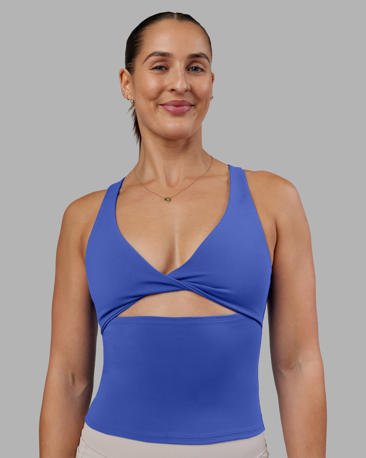 Woman wearing Abs Agile Tank - Power Cobalt | Model:Abbey | Size:M