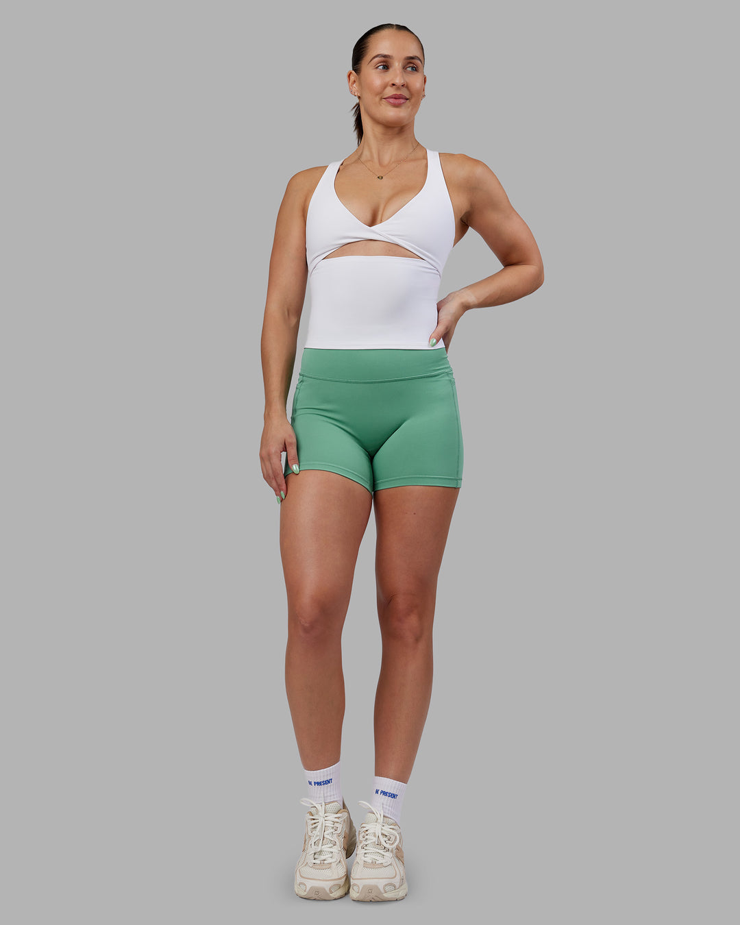 Woman wearing Abs Agile Tank - White | Model:Abbey | Size:M