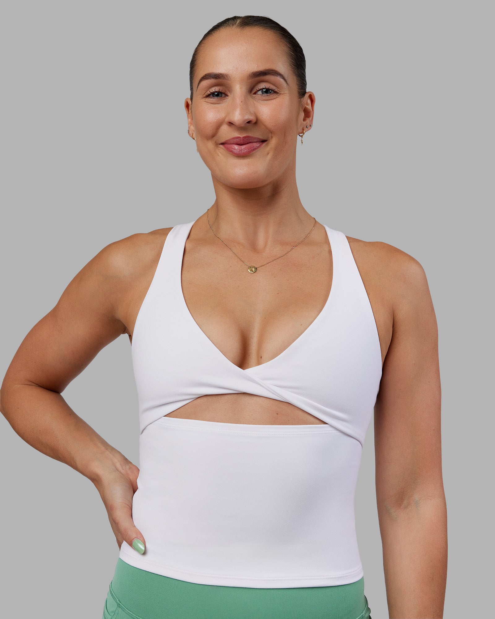 Woman wearing Abs Agile Tank - White | Model:Abbey | Size:M