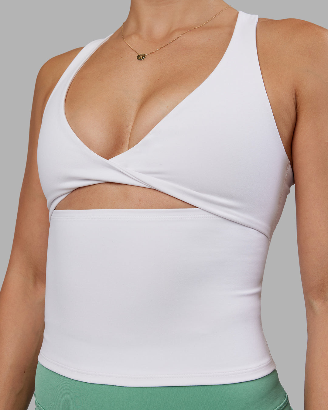Woman wearing Abs Agile Tank - White | Model:Abbey | Size:M