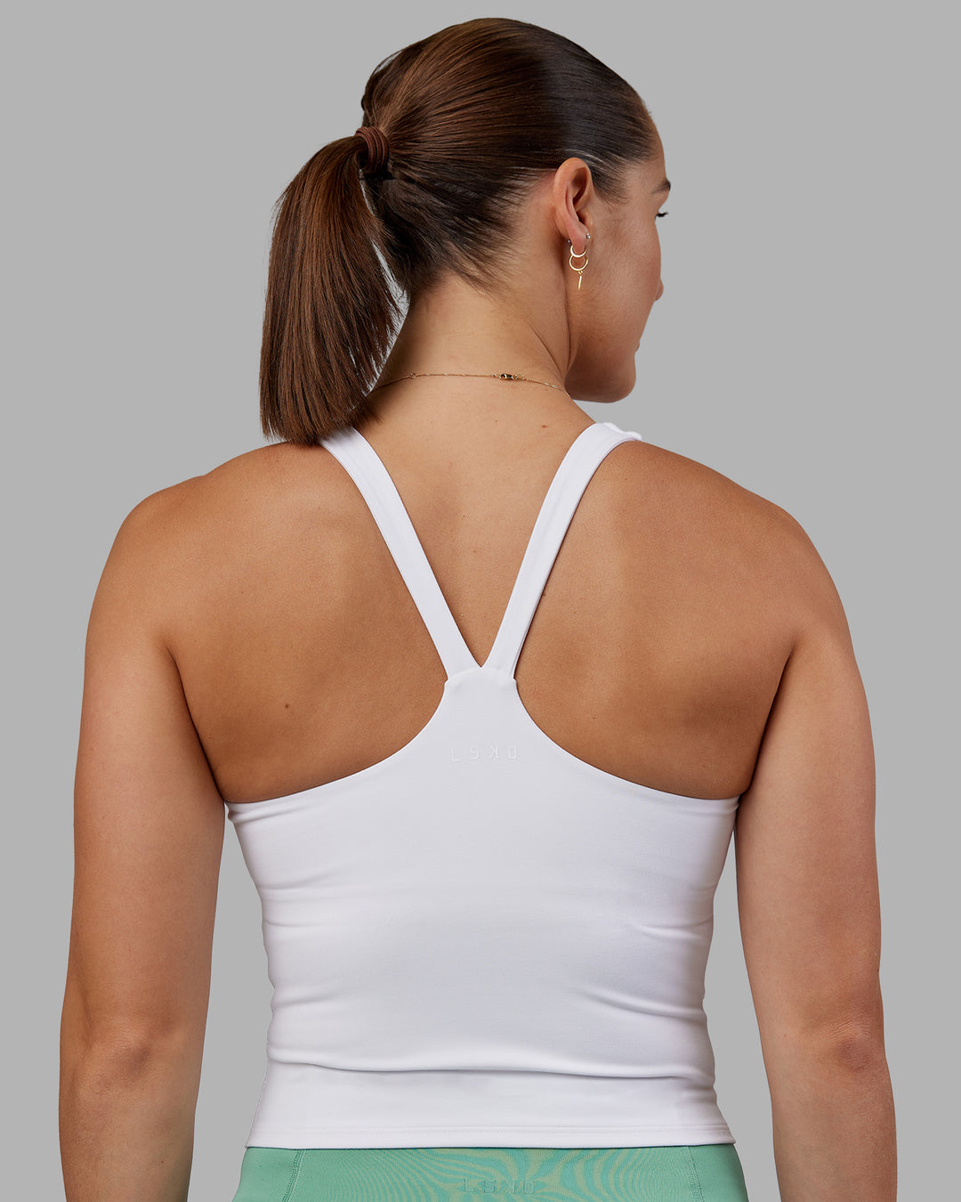 Woman wearing Abs Agile Tank - White | Model:Abbey | Size:M