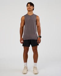 Man wearing AeroFLX+ Seamless Muscle Tank - Duskstone/Duskstone | Model:George | Size:M