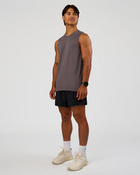 Man wearing AeroFLX+ Seamless Muscle Tank - Duskstone/Duskstone | Model:George | Size:M