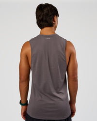 Man wearing AeroFLX+ Seamless Muscle Tank - Duskstone/Duskstone | Model:George | Size:M