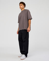 Man wearing AfterDark ZeroCrease Oversized Tee - Duskstone | Model:Leandro | Size:M