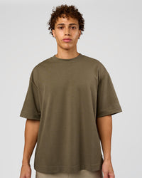 Man wearing AfterDark ZeroCrease Oversized Tee - Walnut Grey | Model:Leandro | Size:M