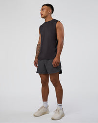 Man wearing AirTrack Muscle Tank - Black | Model:Daarian | Size:M
