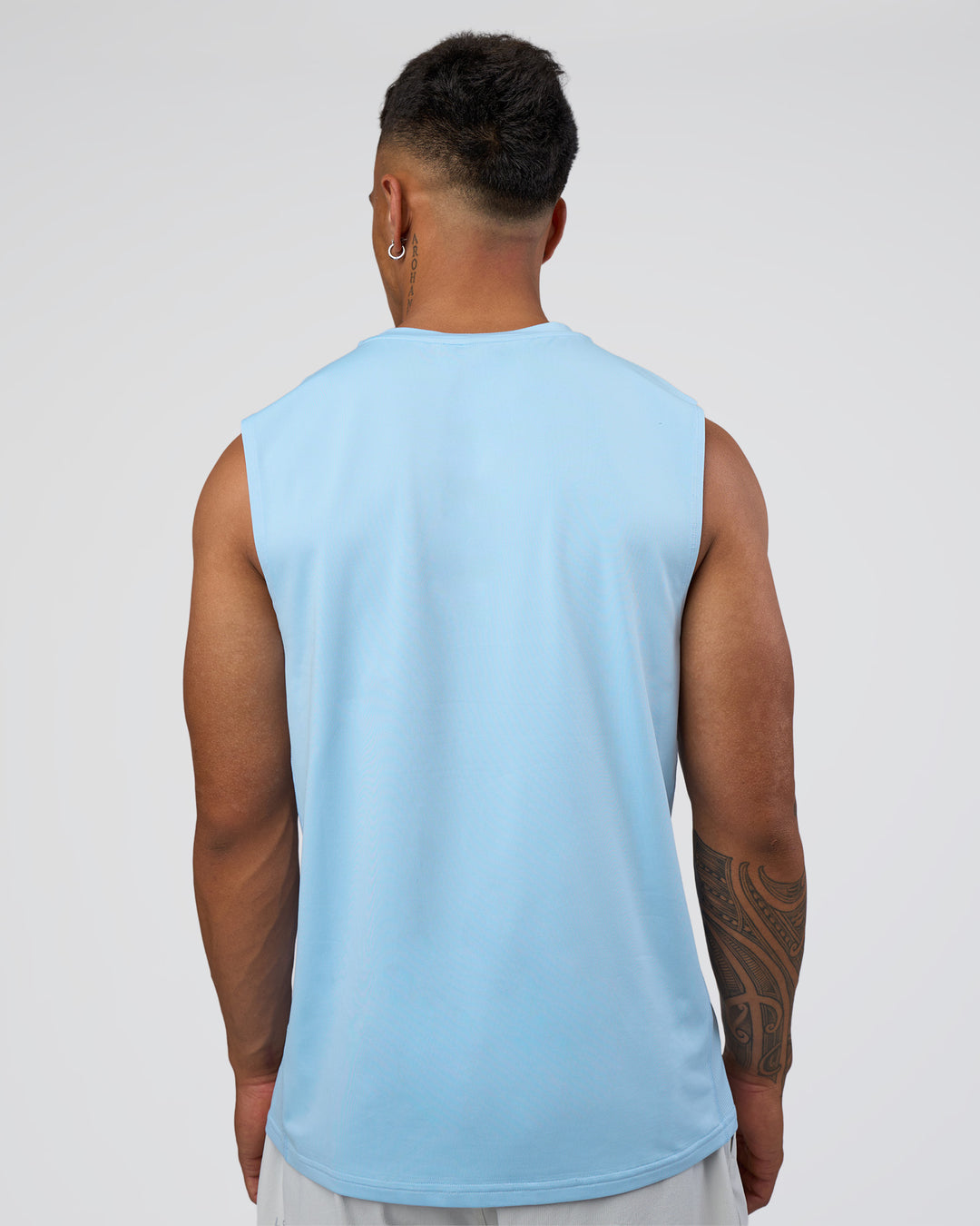 Man wearing AirTrack Muscle Tank - Open Air | Model:Daarian | Size:M