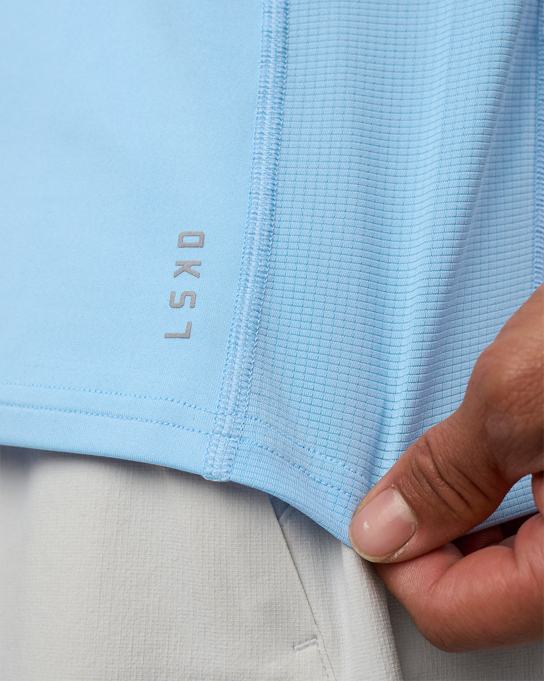 Man wearing AirTrack Muscle Tank - Open Air | Model:Daarian | Size:M