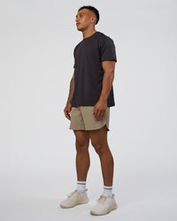 Man wearing AirTrack Tee - Black | Model:Daarian | Size:M