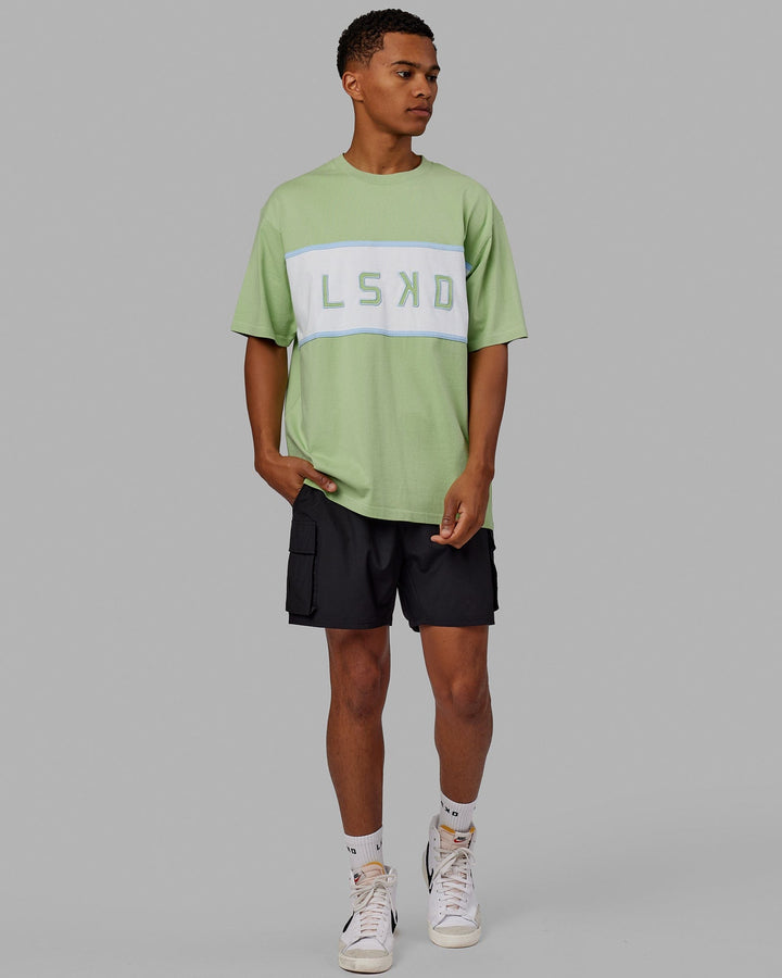 Man wearing Unisex Aligned Heavyweight Tee Oversize - Green Fig