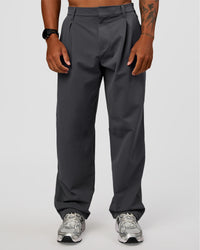 Man wearing All Day ZeroCrease™ Wide Leg Pant - Dark Storm | Model:Malebo | Size:M