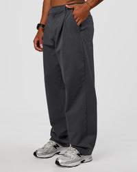 Man wearing All Day ZeroCrease™ Wide Leg Pant - Dark Storm | Model:Malebo | Size:M