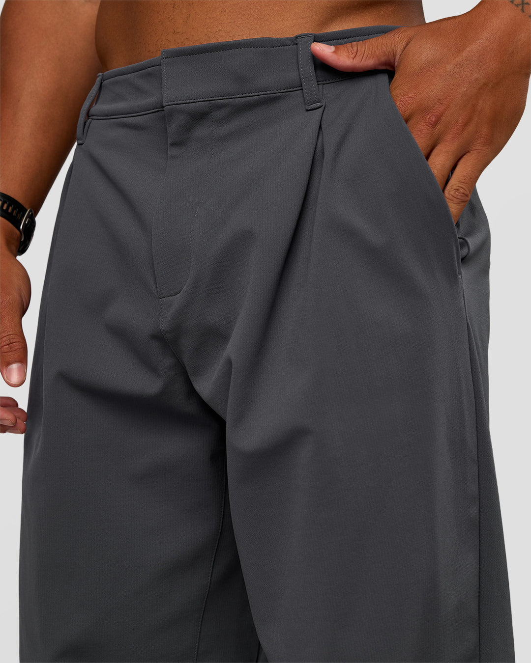 Man wearing All Day ZeroCrease™ Wide Leg Pant - Dark Storm | Model:Malebo | Size:M