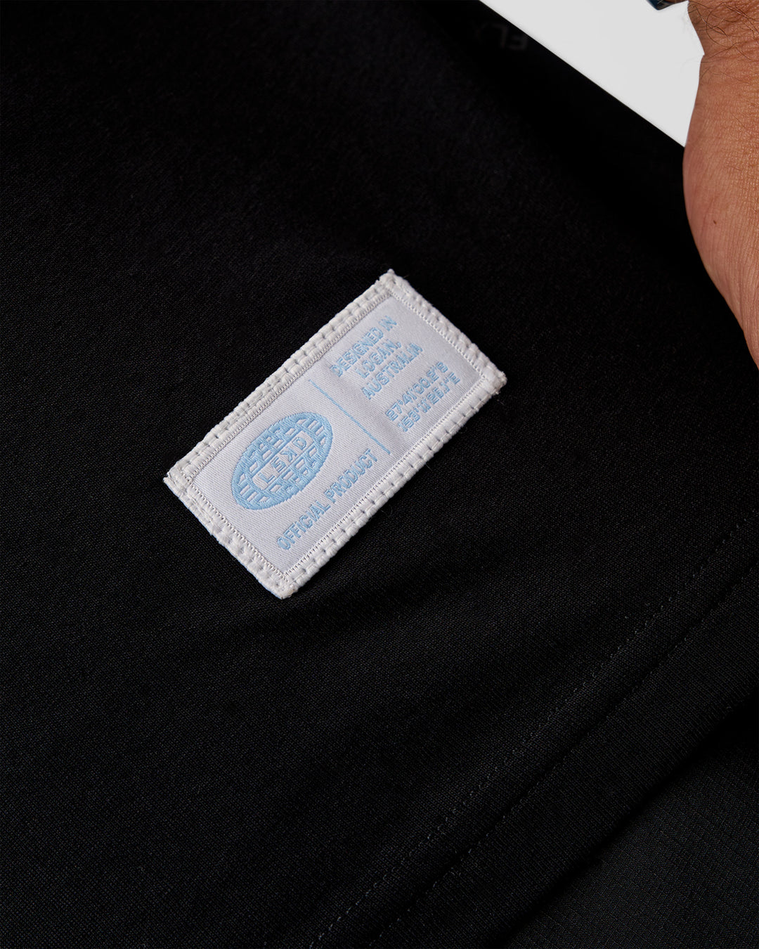 Man wearing Archive FLXCotton Oversized Tee - Black-Open Air | Model:Jaiden | Size:M