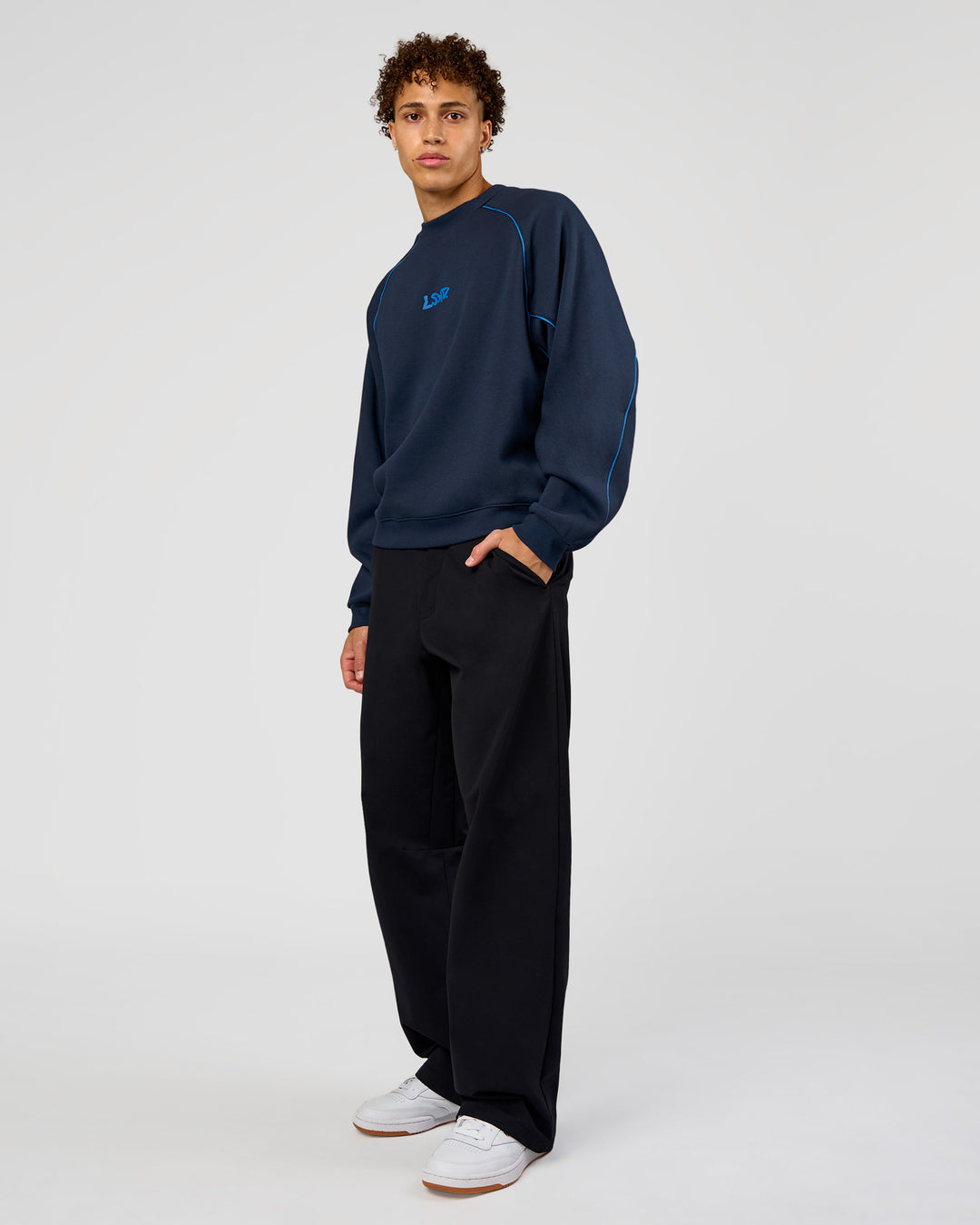 Man wearing Axis Boxy Crew Sweater - Future Navy-Palace Blue | Model:Leandro | Size:M