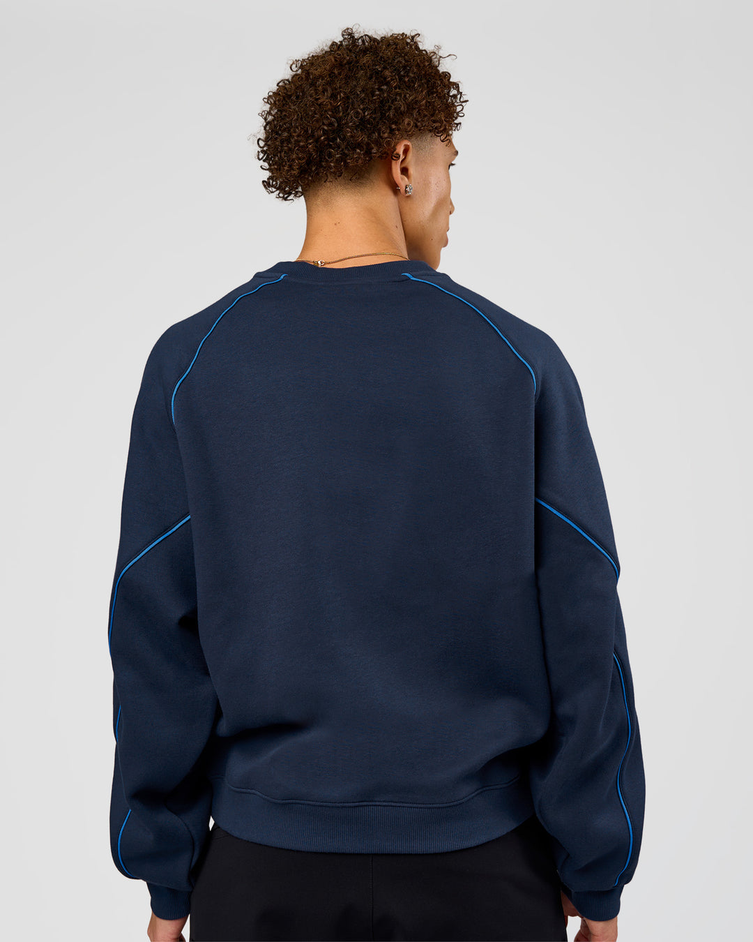 Man wearing Axis Boxy Crew Sweater - Future Navy-Palace Blue | Model:Leandro | Size:M