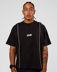 Man wearing Axis Heavyweight Oversized Boxed Tee - Black-White | Model:Malebo | Size:M