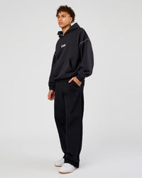 Man wearing Axis Oversized Hoodie - Caviar-White | Model:Leandro | Size:M
