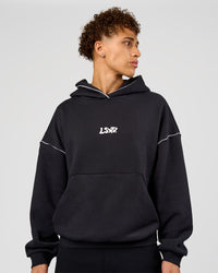 Man wearing Axis Oversized Hoodie - Caviar-White | Model:Leandro | Size:M