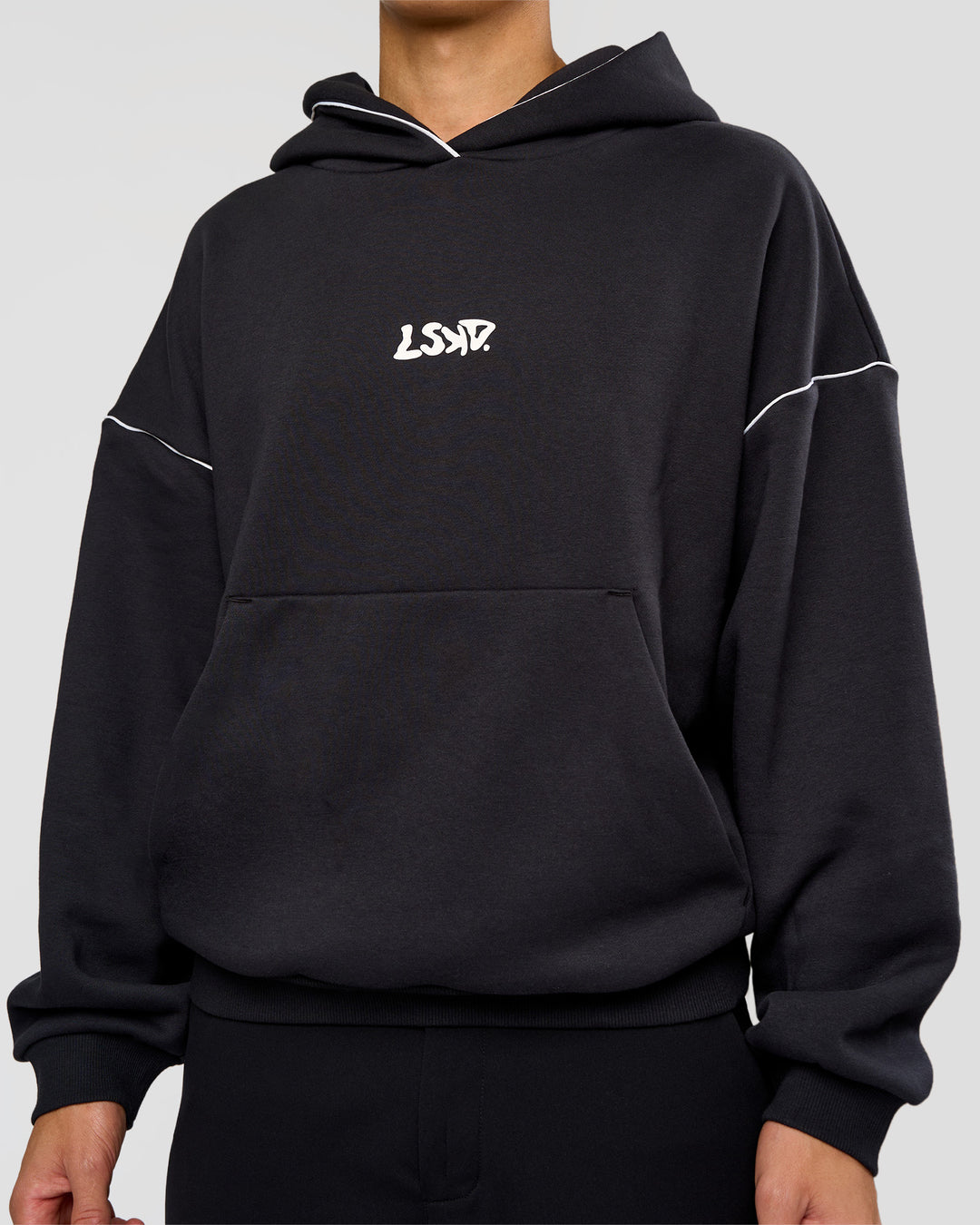 Man wearing Axis Oversized Hoodie - Caviar-White | Model:Leandro | Size:M