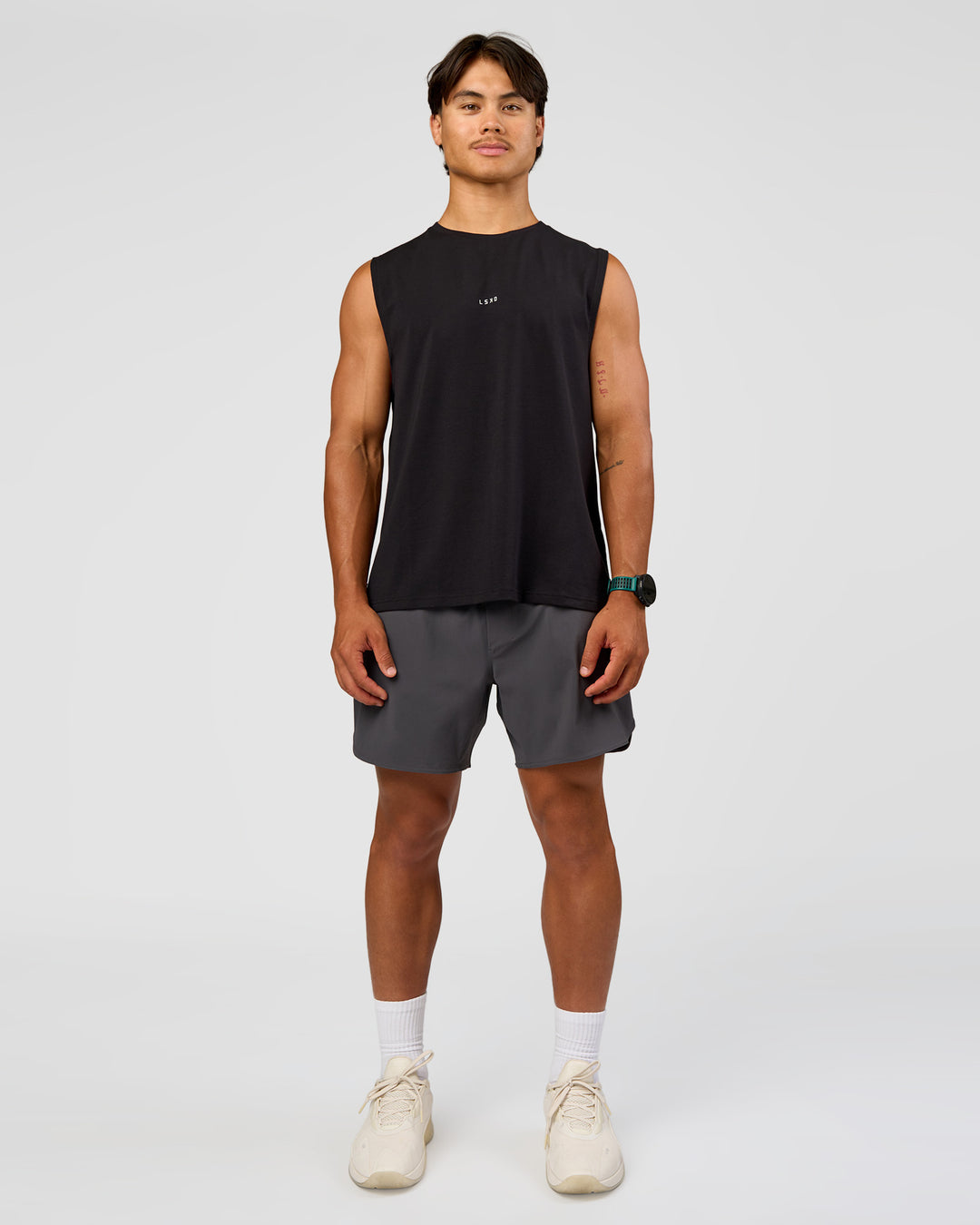 Man wearing Base FLXCotton Tank Regular Fit -8cm - Black | Model:George | Size:M
