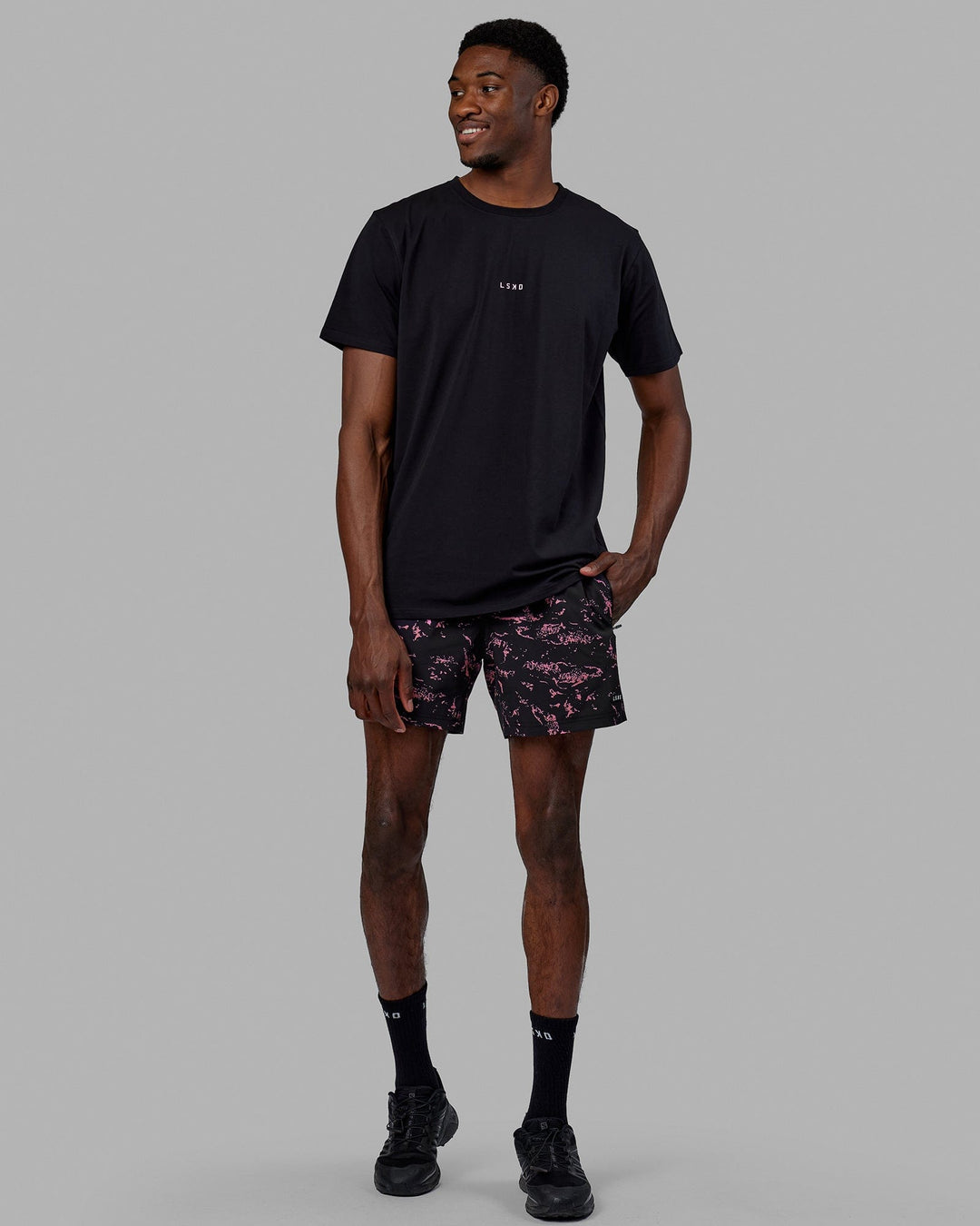 Man wearing Base FLXCotton Tee - Black-Pink Rose
