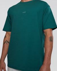 Man wearing Base FLXCotton Tee Oversized - Transformative Teal | Model:Konnor | Size:M